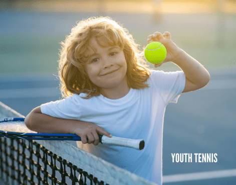 Youth tennis player on an outdoor court holding a ball and racket, ready to play during a youth tennis program with Lifetime Activities.