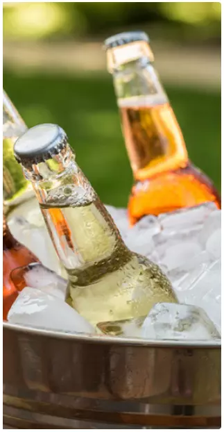 Cold bottled drinks in a bucket of ice from catering services at Sunnyvale pickleball parties and private events venue.